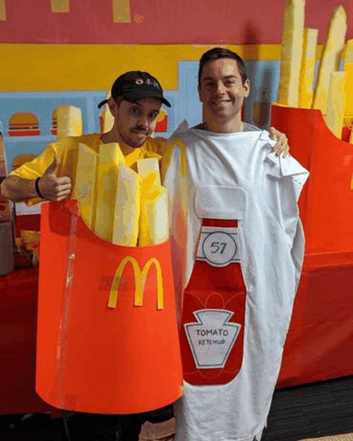 Brendan in a McDonald's french-fries Halloween costume next to a friend dressed as a ketchup bottle.